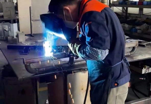 Workers Welding with Arc Light Workers Welding with Arc Light
